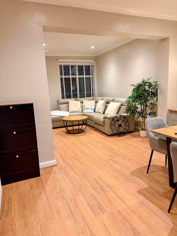 Oak effect laminate fitted in a living room near Wrexham