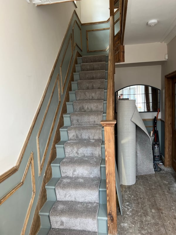 Silver twist runner on period stairs