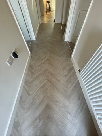 Grey herringbone vinyl hallway