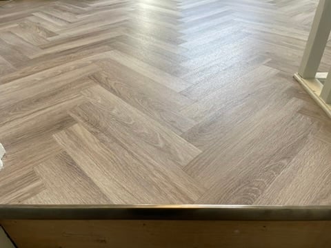 Grey herringbone LVT step