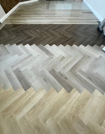 Two-tone herringbone LVT