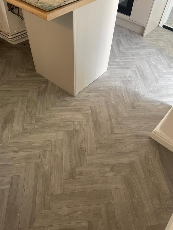 Herringbone laminate fitted on a landing in Wrexham