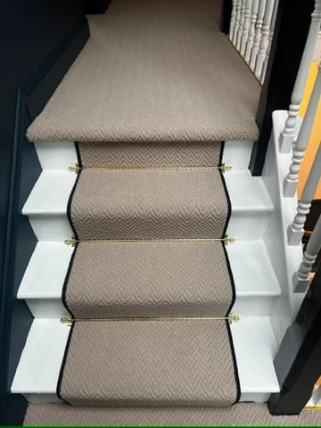 Herringbone runner with stair rods