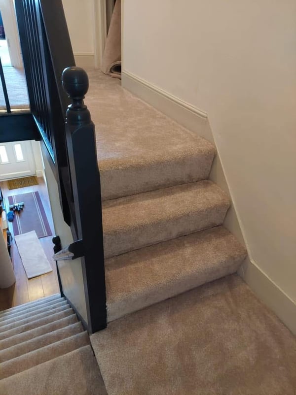 Beige stairs and landing carpet